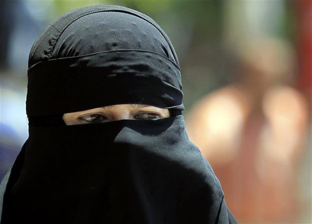 Veiled French Muslim woman charged with inciting riot
