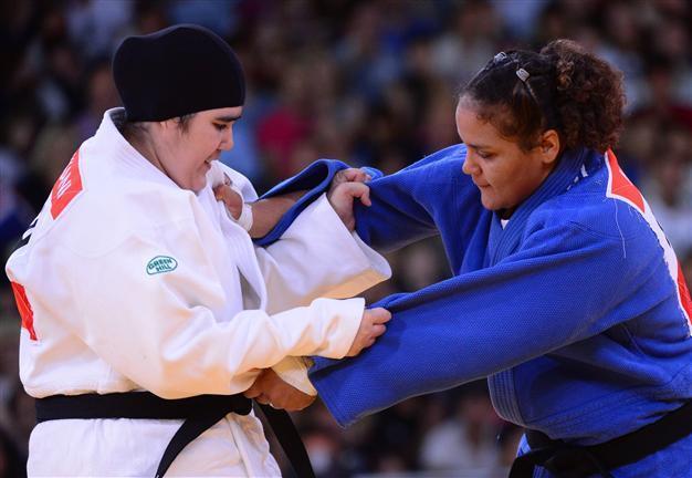 Saudi womans historic bow over in 82 seconds
