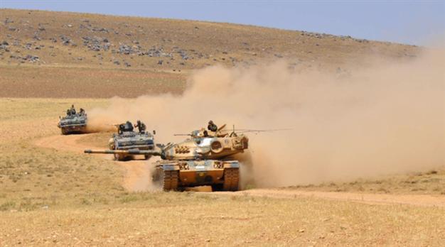 Turkish army conducts drills on Syrian border