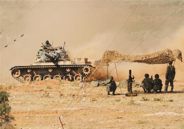 Violence spirals in Syria, killing more than 100