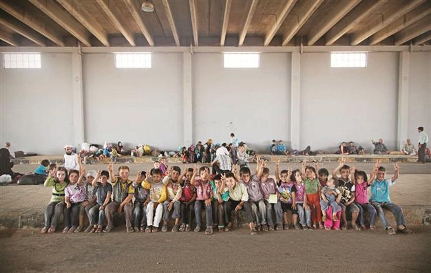 Number of Syrian refugees nears 70,000
