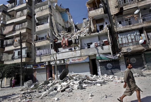 Airstrike kills 8 in Syria town near Turkey border: report