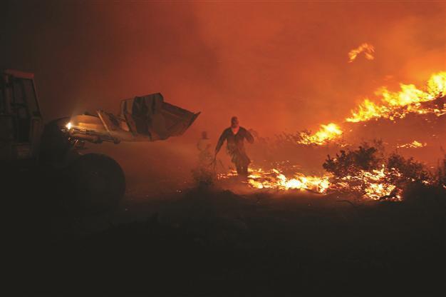 Greek secret service to investigate arson claim