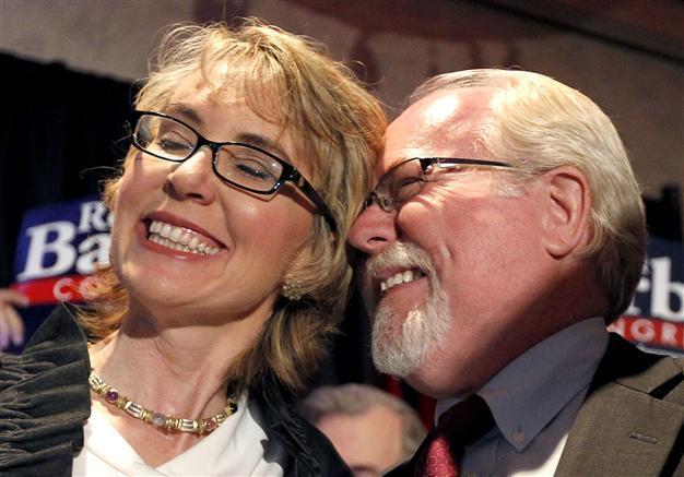 Survivor of shooting spree wins US House seat