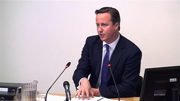 Britains Cameron denies deals with Murdoch