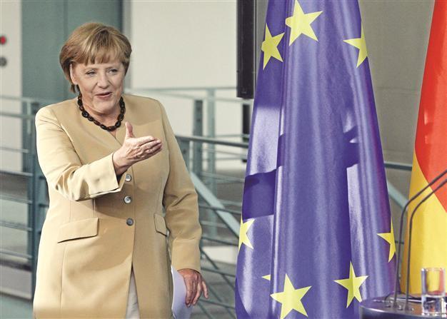 Chancellor Merkel wants new EU treaty, report says