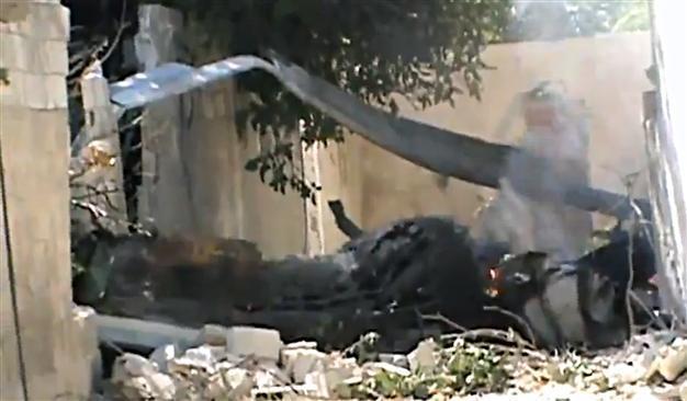 Syria rebels say 5 choppers wrecked in airport raid