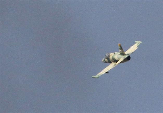 Syria rebels say shot down fighter plane near Turkish border