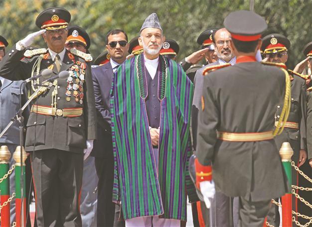 Karzai solidifies power with sackings amid fresh violence