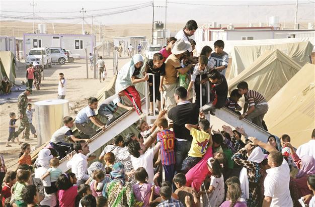 Turkey to keep its door open to Syrians, call UN for action