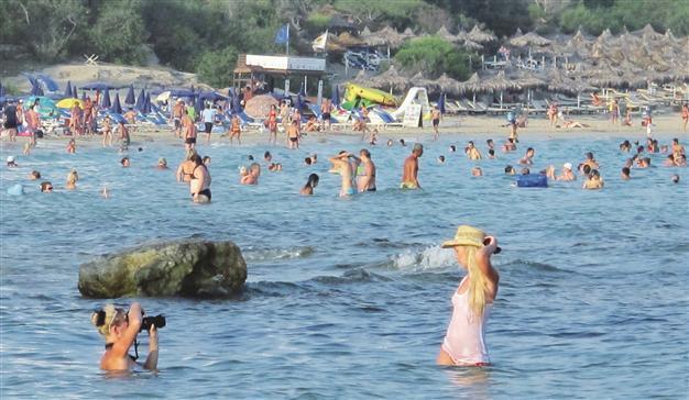 Crisis-hit Greek Cyprus enjoys tourism revenues