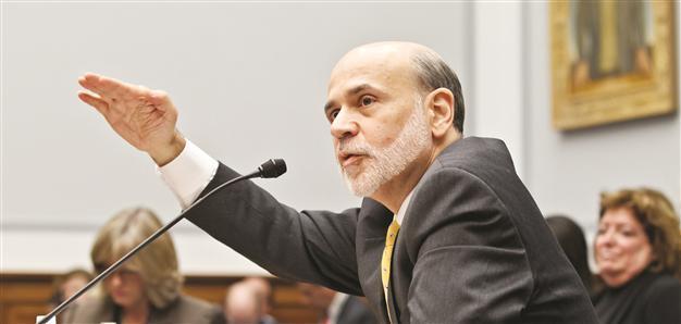 Investors await Bernanke speech