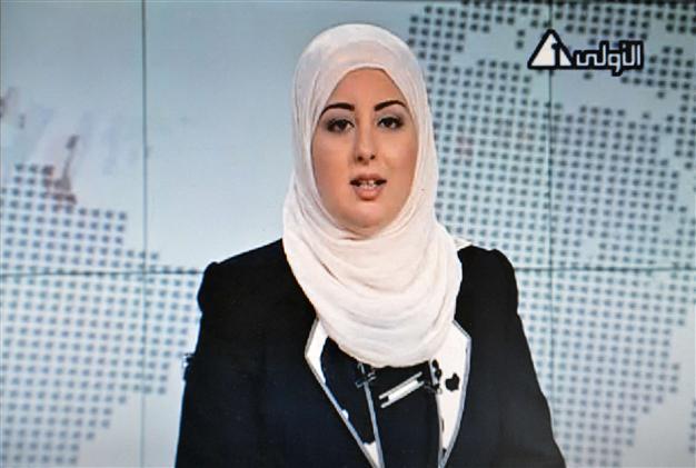 Egypts first veiled news anchor appears on state TV