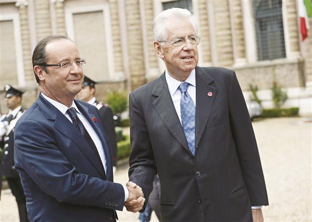 Monti calls for drop in borrowing costs