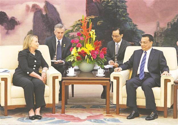 Beijing and Washington soften tone on South China Sea dispute