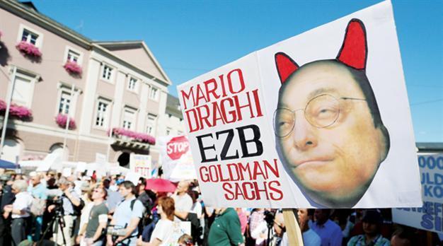 IMF seeks role in saving euro, analysts warn about Madrid