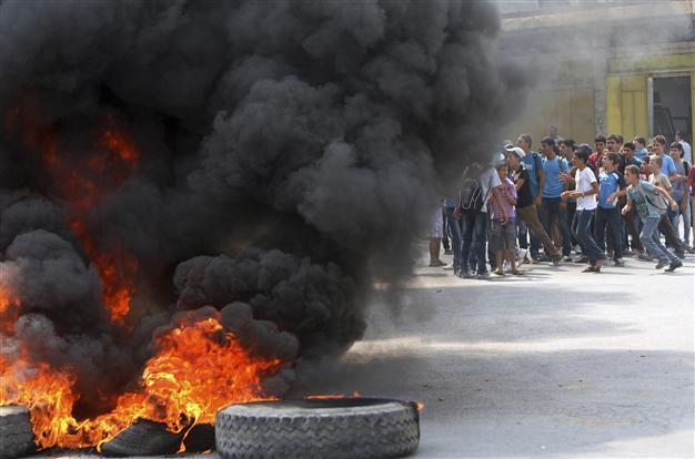 Palestinians strike to protest rising prices