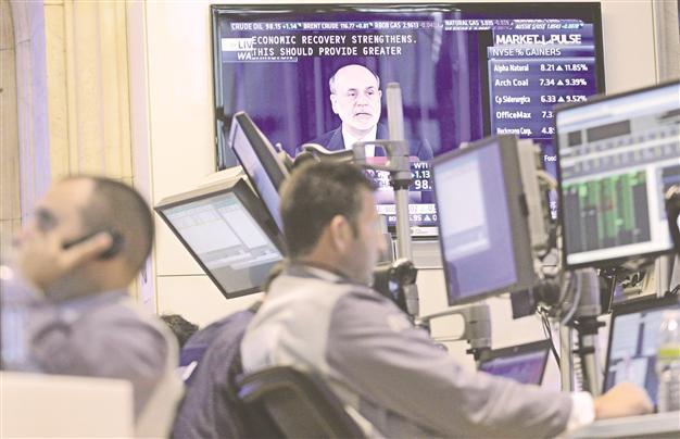Fed enacts bond-buying program