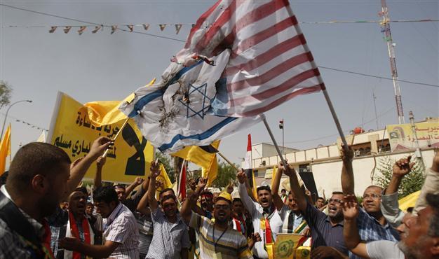 Iraqis burn US, Israeli flags in anti-Islam film demo