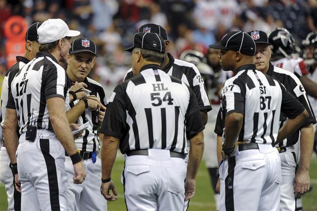 League, referees reach deal to end lockout