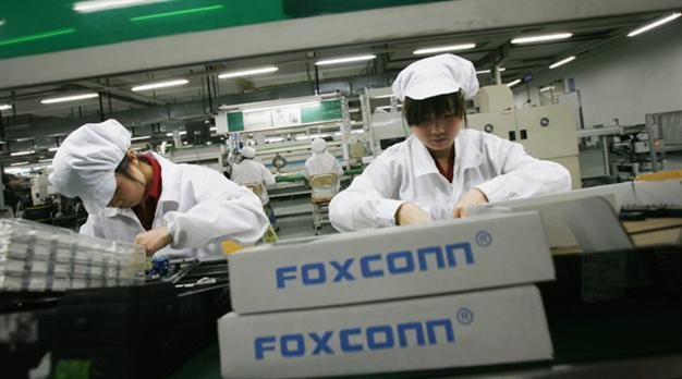 Apple, Foxconn improve conditions at China plants, but more needed: audit