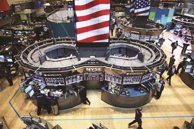 Signals of stimulus from Federal Reserves pushes stocks, oil up