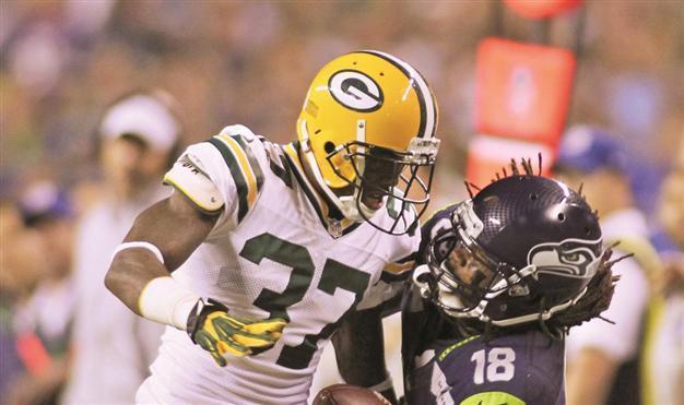 Seahawks beat strong Packers on controversial touchdown