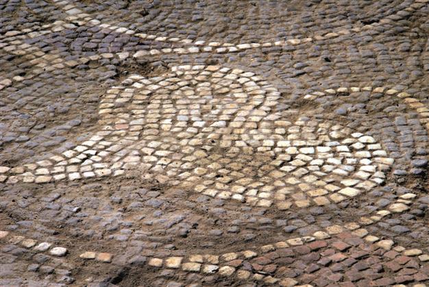 Illegal diggings reveal ancient church, mosaics
