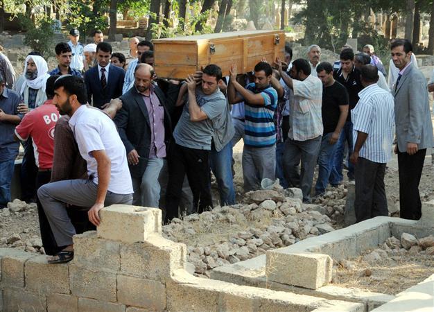 Locals turn anger on officials at funerals