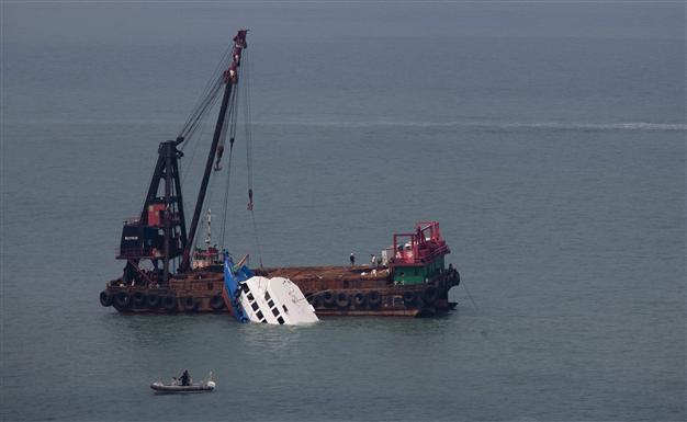 Six crew arrested after Hong Kong ferry collision kills 37