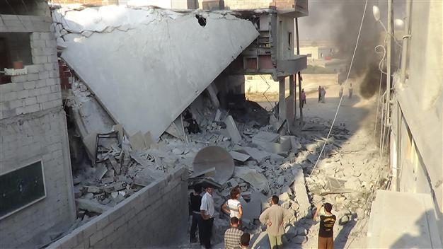 8 children among 21 killed in Syria air strike: watchdog