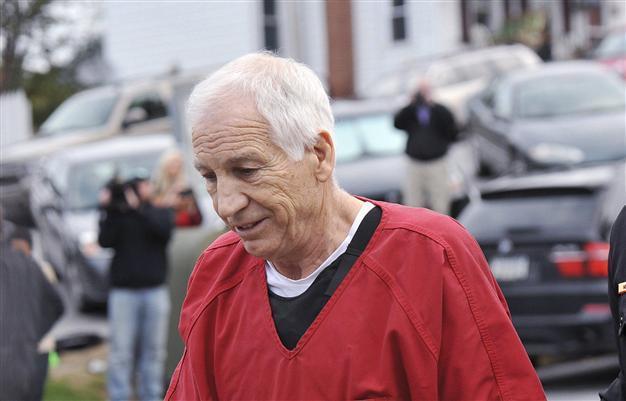 US college coach Sandusky jailed for life for child sex