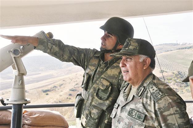 Özel visits border posts amid inflaming tension