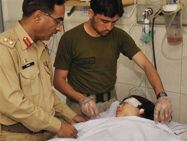 Pakistani doctors work through night to save girl shot by Taliban