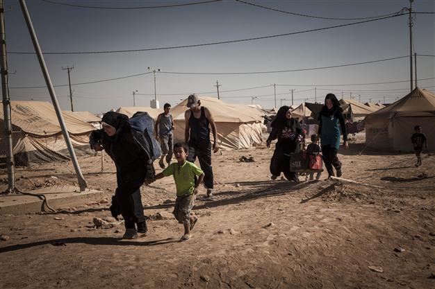 First camp for refugees in Syria rises tent by tent
