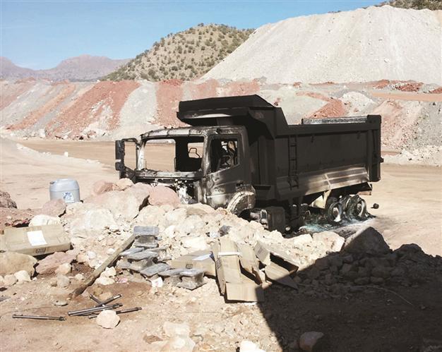 PKK kidnaps two, burns vehicles