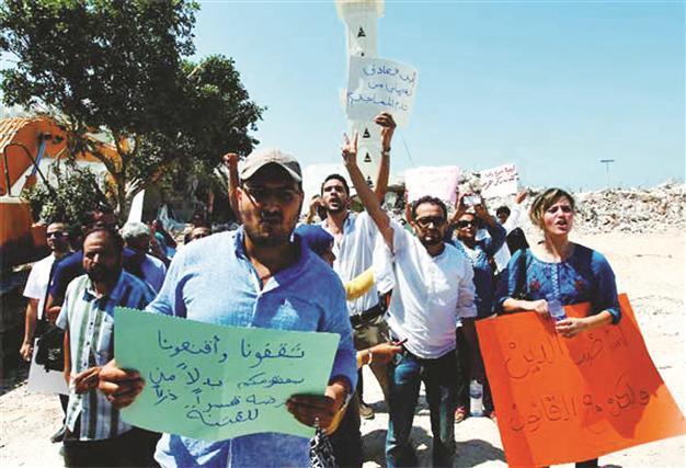 Local people gather to protect holy sites