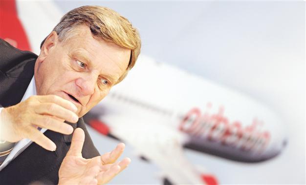 Air Berlin says it will step up cost-cutting