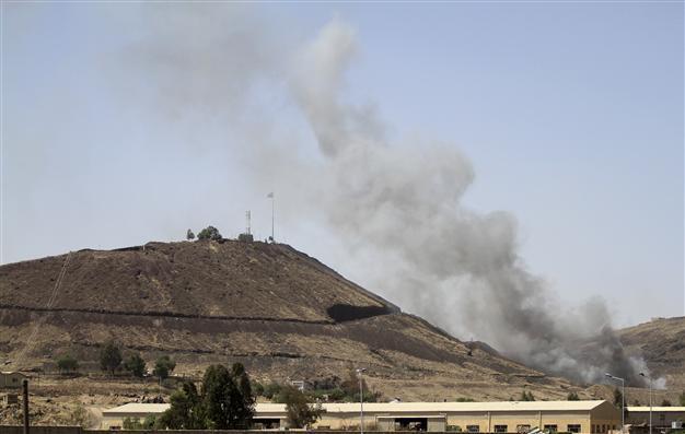 Suspected al Qaeda attack on Yemen army base kills 26