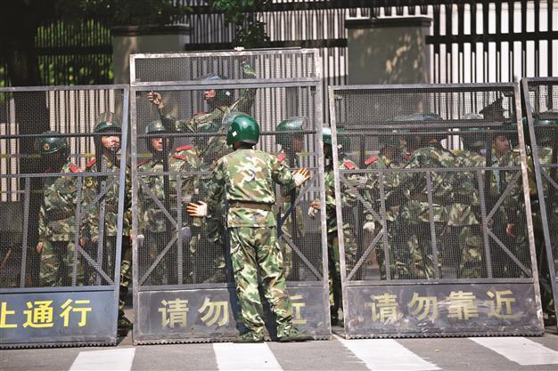 Xi hits out at Japan over row as protests ease off