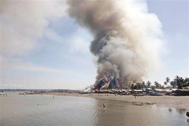 Fresh sectarian violence hits Myanmar, killing 20