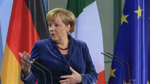Merkel says exit from euro crisis to take at least five years