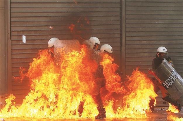 Greek coalition passes key budget cuts despite anger