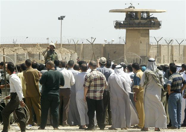 Dozens escape in deadly raid on Iraqi prison