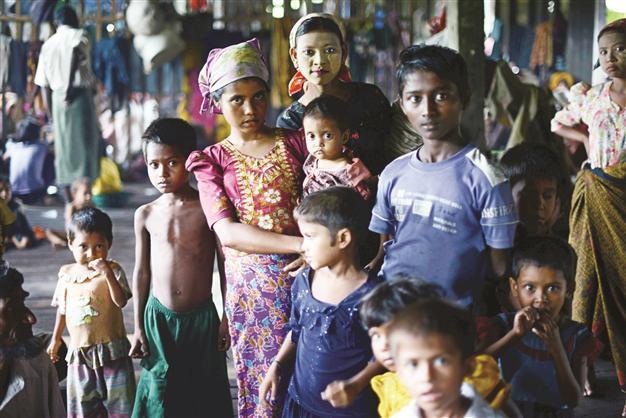 Influx hits Myanmar camps