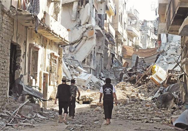 Rebels shell pro-Assad district in Damascus