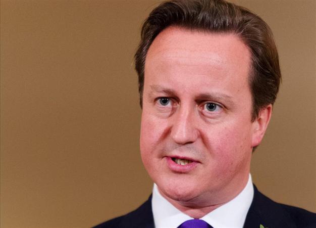 Britain says would agree safe exit for Syrias Assad