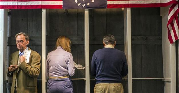 Reds and Blues anxiously await first exit poll results