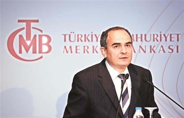 Central bank cuts rates, hints at stronger action