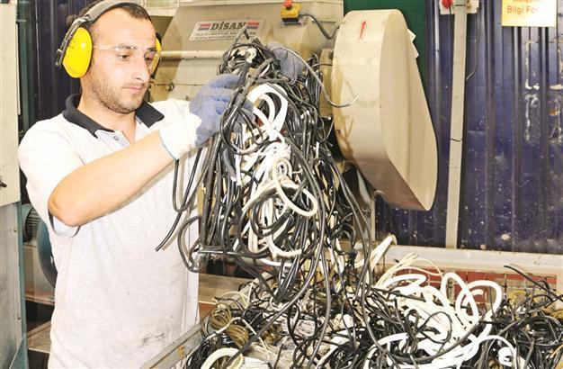 Tons of e-waste waiting for new recycling plants